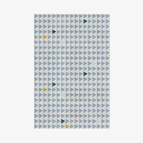 Tapis rectangle aux motifs géométriques bleus